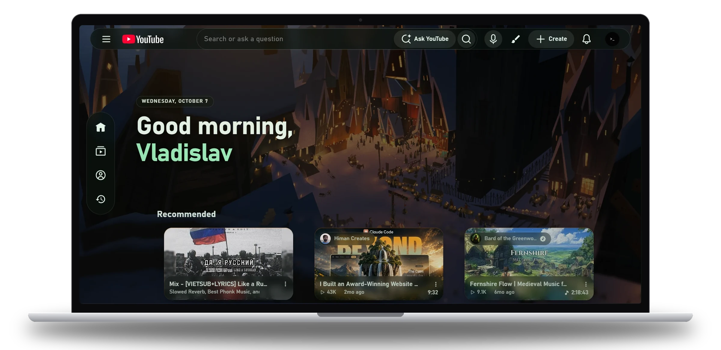 A laptop showing the YouTube home page with Minimal Network: a custom wallpaper, a greeting with the date, a floating sidebar and three recommended videos.